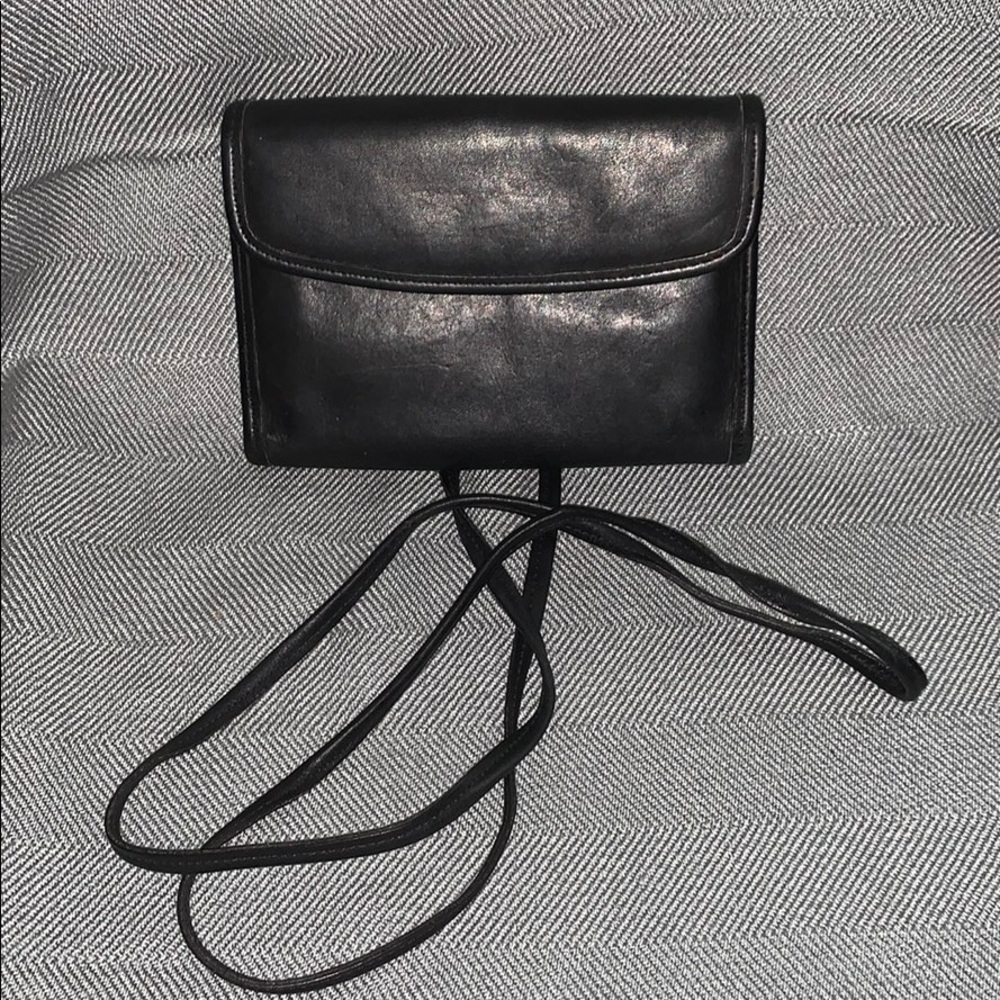 Authentic Coach cross body wallet.